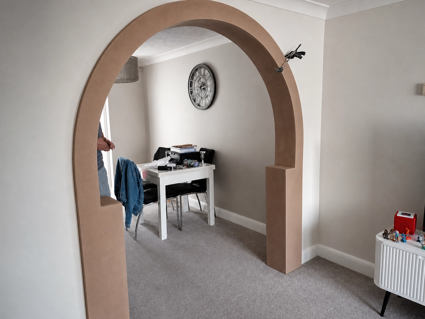 Hand-formed plaster archway